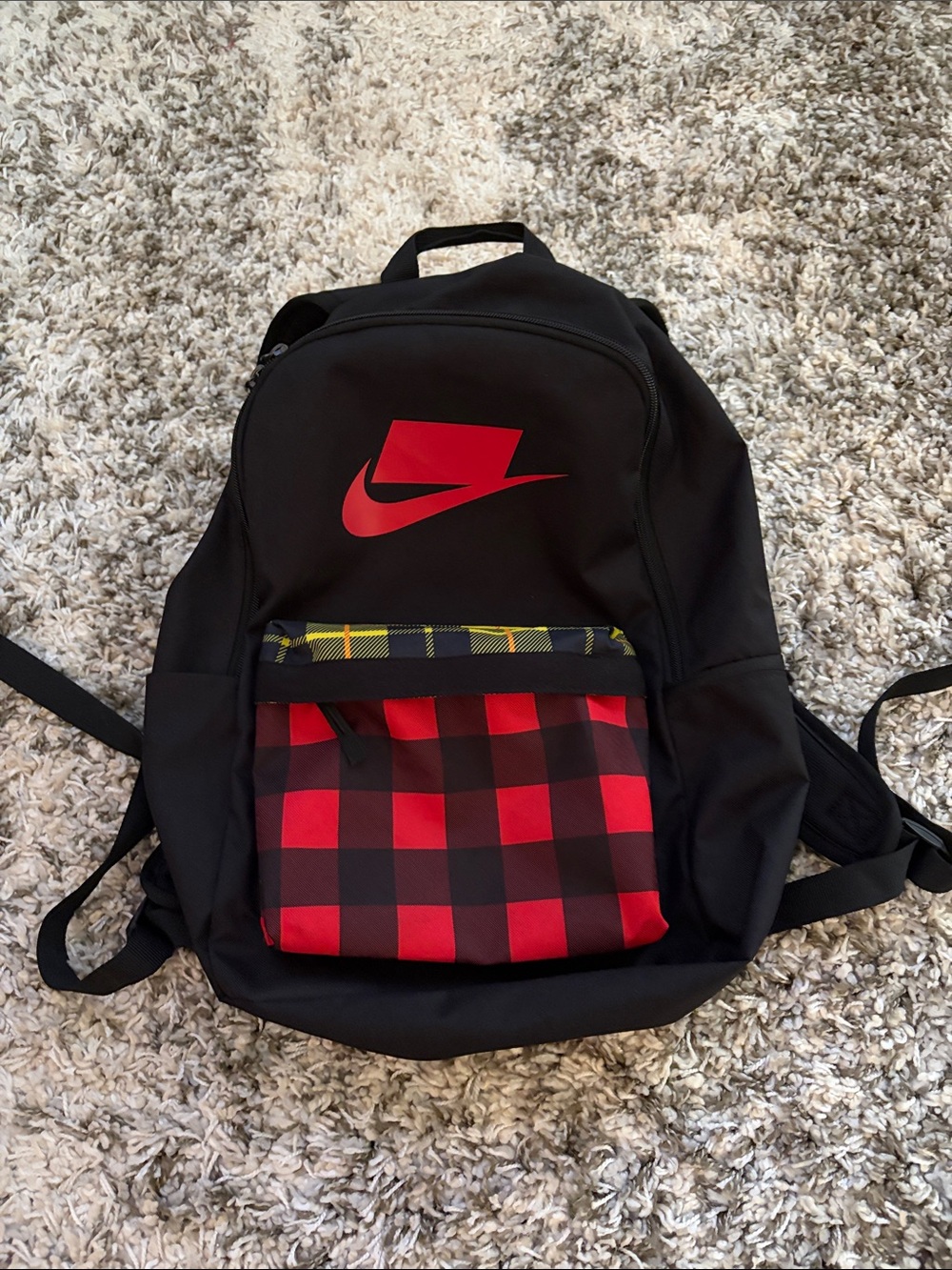 Nike Black Backpack with Red Logo and Red-Black Check Front Pocket